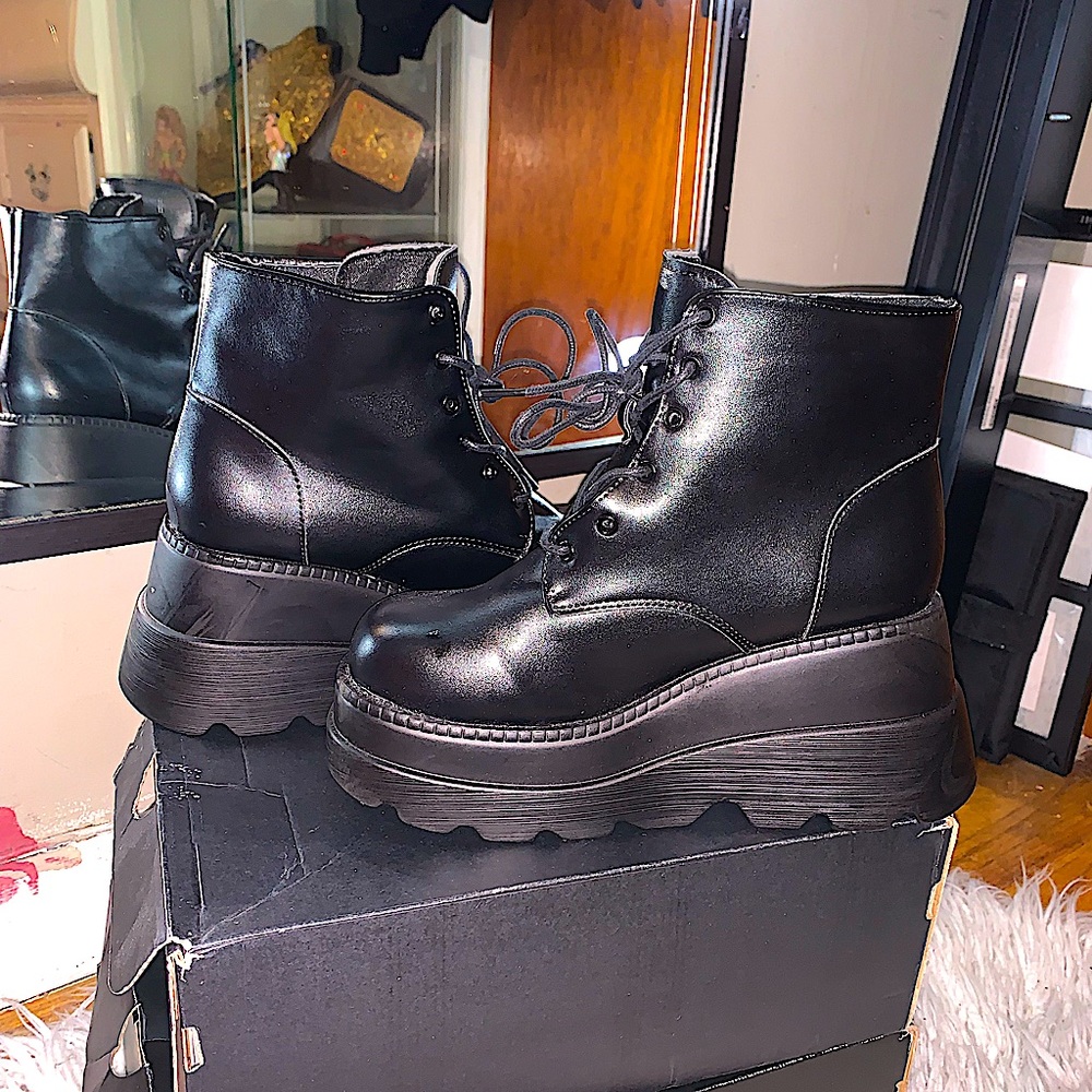 Demonia Platform Boots in a size 10 black